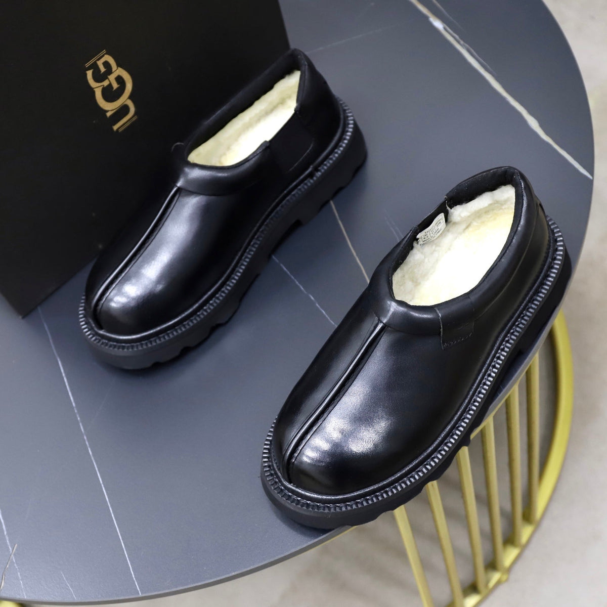 UGG Black Leather Slip-On Casual Shoes
